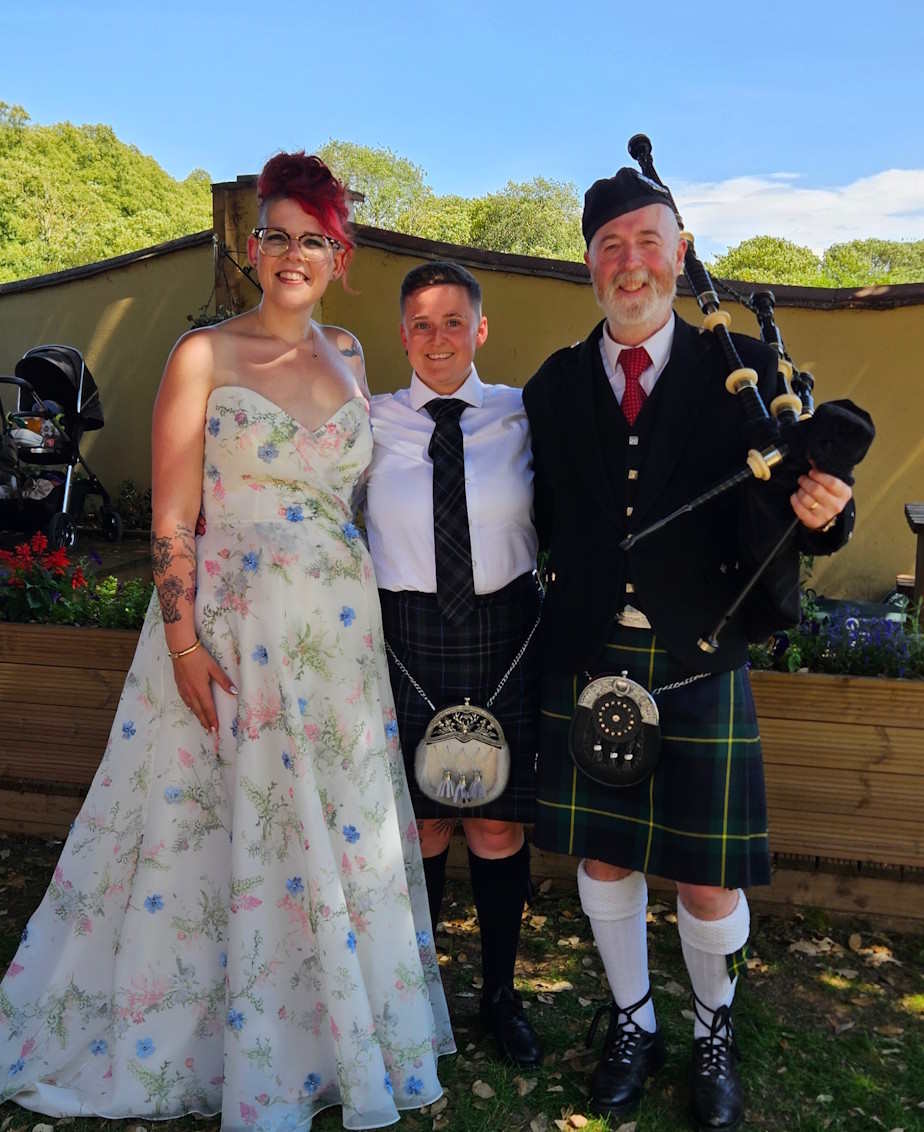The Suffolk Bagpiper playing at a wedding at Brome Grange, Suffolk